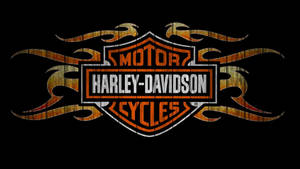 Harley-Davidson 標誌，帶有橙色火焰設計，黑色背景。