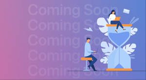 兩個人坐在沙漏上使用筆記本電腦工作，背景有「Coming Soon」文字。