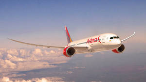 Avianca飛機在日落時分飛越雲層 — 飛機 壁紙
