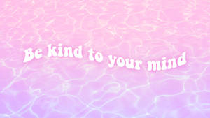 粉紅色和紫色的水波紋，上面有白色勵志文字寫著 be kind to your mind。