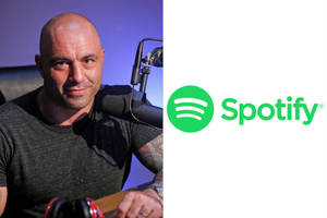 紋身男子在咪高峰前，旁邊有Spotify標誌