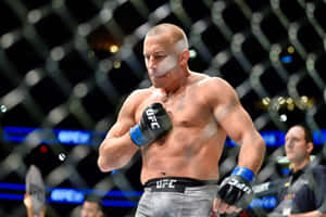 UFC拳手在比賽期間於八角籠內擦汗。