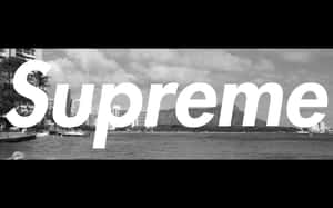 黑白色海岸城市照片，帶有 'Supreme' 文字覆蓋。