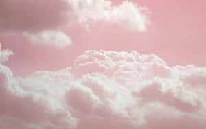 粉紅天空上，蓬鬆的白雲輕輕飄過。 — 淺粉紅色美學動圖 壁紙