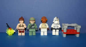 藍色表面上的四個LEGO Star Wars角色和一個長凳。 — 里維·阿卡曼 GIF 壁紙