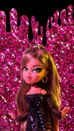 穿著黑色服裝的 Bratz 公仔，背景為帶有黑色滴落的粉紅閃粉。