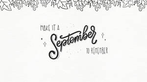 手寫字句 Make It A September To Remember 以秋葉框住。