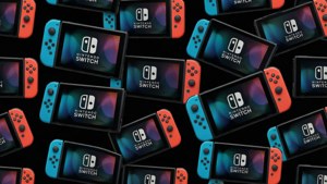 多個帶有紅色和藍色控制器的Nintendo Switch遊戲主機，黑色背景。