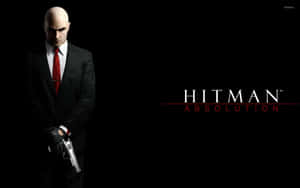 Hitman 角色穿著黑色西裝手持手槍，顯示遊戲標題。