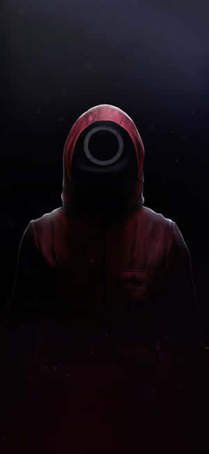 一個 hooded 人物喺黑暗環境中帶住發光嘅眼罩。