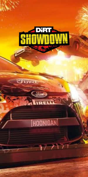 一輛帶有 Hoonigan 品牌的福特賽車，在煙火中穿過火熱的日落。 — 18:9 壁紙