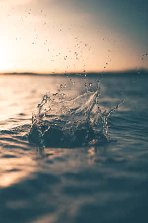 夕陽下的海面水花 — 小米Pad 壁紙