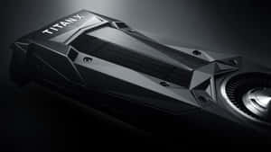 黑色 Titan X 顯示卡的近距離特寫，具有棱角設計和金屬裝飾。 — 5120x2880 壁紙