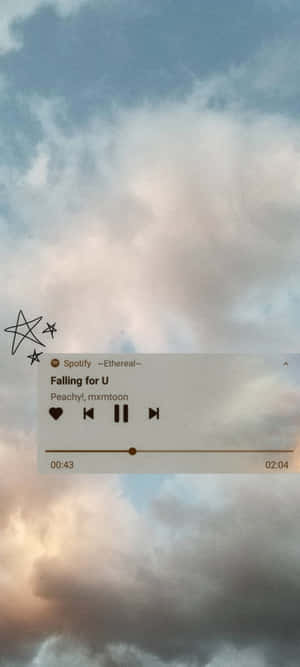 在雲朵天空背景上帶有手繪星星的 Spotify 音樂播放器。 — 音樂美學 壁紙