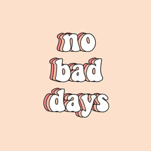 蜜桃色背景上帶粉紅陰影的粗體白色文字勵志短語 no bad days。 — iPad (A16) 壁紙