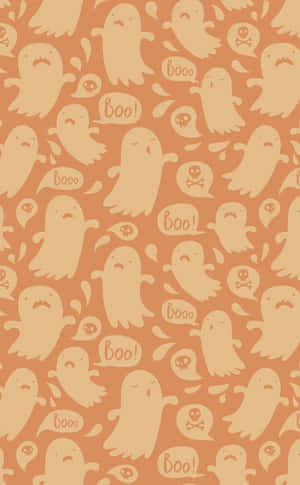 橙色背景上帶有骷髏和「boo」對話氣泡的可愛萬聖節幽靈。 — 恐怖萬聖節 壁紙