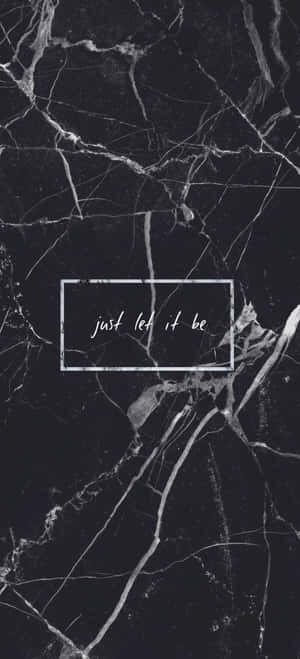 黑色大理石背景，帶有白色紋理同文字框，寫住 just let it be。
