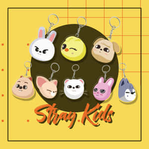 七個帶有Stray Kids品牌的卡通動物鎖匙扣，位於黃色網格背景上。