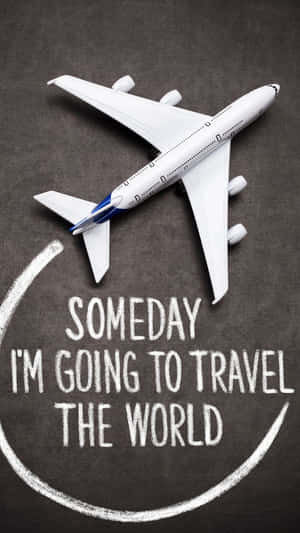 黑板上的玩具飛機，附有訊息「someday i'm going to travel the world」。 — 風景動圖 壁紙