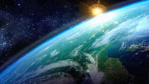 從太空看地球，太陽在各大洲和海洋上空升起。