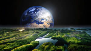 夜間太空中巨大地球下的苔蘚地形和河流。