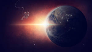 在充滿活力的日出期間，太空人在地球附近的太空漂流。 — 行星 壁紙