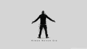 一個男人分解成粒子，帶有文字 kings never die