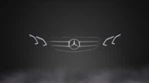 Mercedes-Benz 鬼面罩和標誌在黑暗煙霧氛圍中與風格化頭燈一同發光。