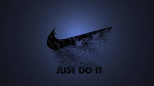 Nike剔勾標誌分解成粒子，並帶有「JUST DO IT」文字。
