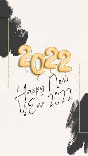 金色2022氣球，帶有'Happy New Year 2022'文字，背景簡約，帶有黑色墨水飛濺。