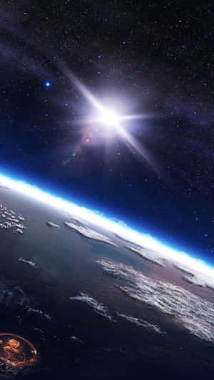 從太空看到的地球，明亮的星爆陽光在地平線上閃耀。 — 銀河系 壁紙