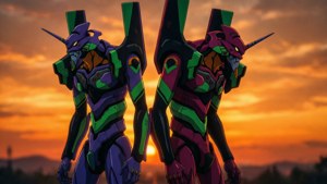 兩台巨型動畫機甲在鮮豔的橙色夕陽下呈現剪影。