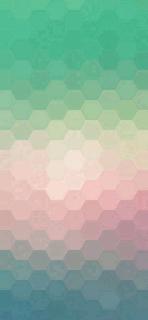 具有柔和粉彩漸變色六邊形圖案的抽象壁紙。 — Pixel 8a 壁紙