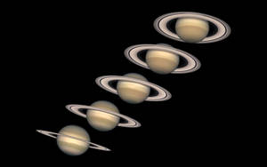 五個帶環的土星行星在太空中斜向排列。 — 行星 壁紙