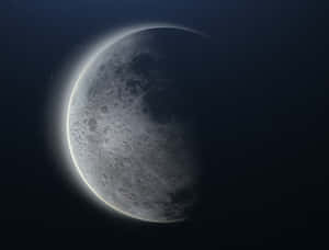 彎月，發光邊緣和隕石坑，繁星夜空。 — 月亮 壁紙