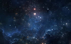 一個充滿活力的宇宙星雲，帶有藍色和橙色的雲層以及無數的星星。