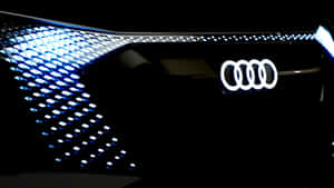 Audi 汽車前格柵在黑暗中發出藍色 LED 光芒。 — 汽車 壁紙