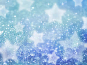 柔和藍色調中帶有閃爍星星和閃耀燈光的天體場景。 — 夢境 GIF 壁紙
