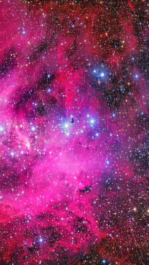 一個色彩繽紛的星雲，充滿了粉紅色、紫色和藍色色調的星星和宇宙塵埃。