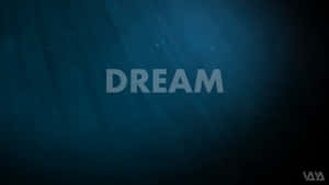 「DREAM」呢個字喺帶有光線同粒子嘅深藍色水入面漂浮。 — 夢境 GIF 壁紙