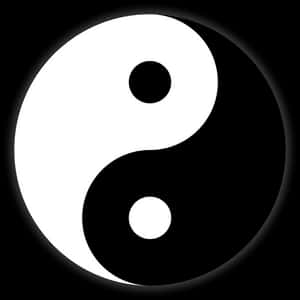黑暗背景上帶有黑白漩渦的陰陽符號