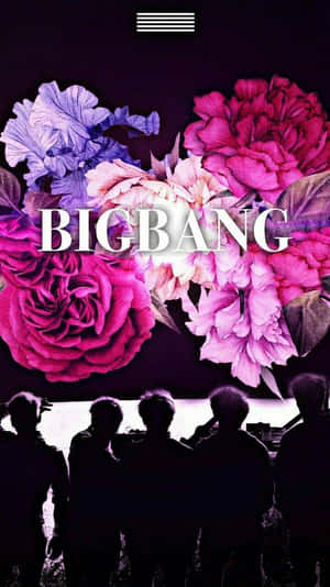 人物剪影仰望帶有「BIGBANG」文字的大型彩色花朵。 — 史詩 壁紙