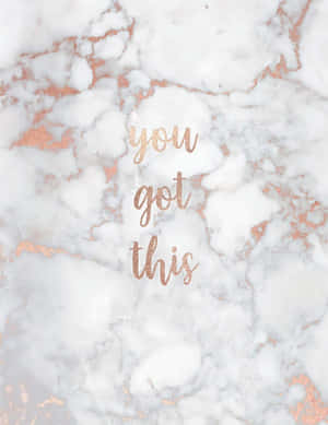 白色大理石上以玫瑰金色點綴的勵志字句「you got this」。 — 灰色 GIF 壁紙