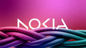 Nokia 標誌在漸變背景上，位於彩色編織電纜上方。 — Nokia 壁紙