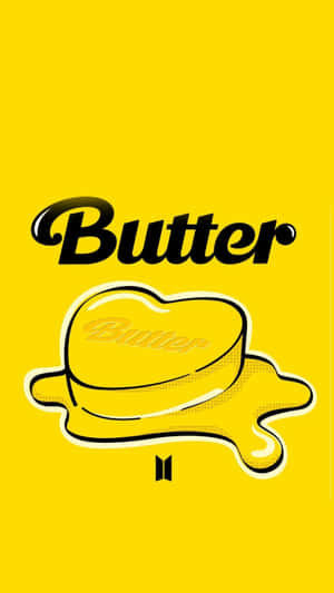 一個滴落的牛油塊，在黃色背景上有黑色文字寫著Butter。 — 簡單 壁紙
