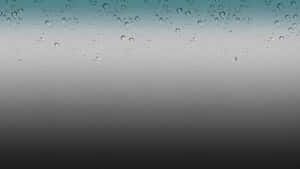 玻璃上的雨滴，背景為藍灰色漸層