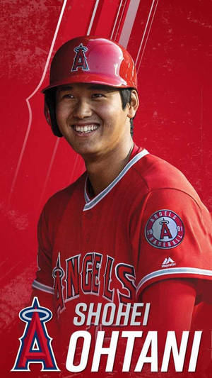 棒球運動員大谷翔平身穿紅色天使隊球衣對著鏡頭微笑。