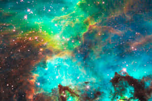 色彩繽紛的星雲，帶有青綠色和橙色調的發光星星。 — 太空 壁紙
