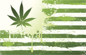 大麻葉在垃圾風格的美國國旗上滴下綠色油漆。
