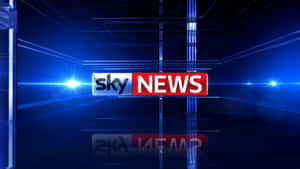 Sky News 標誌在高科技藍色廣播攝影棚中，帶有鏡頭光暈。 — 螢光藍 GIF 壁紙